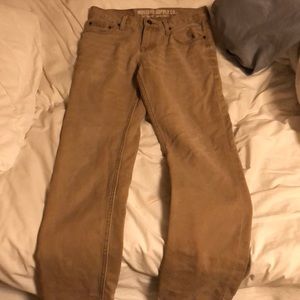 Extremely tiny hole near left knee